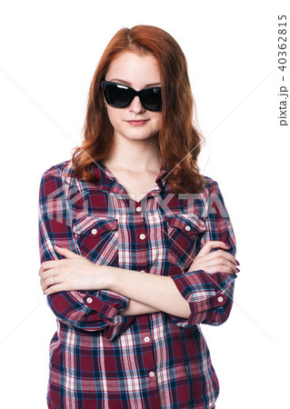 Young girl with arms crossed in plaid shirt Young girl with arms crossed in plaid shirt 40362815
