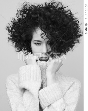 Fashion portrait of beautiful asian woman in white pullover 40367278