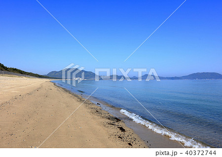 福岡市西区 佐賀県唐津の海岸空撮 福岡市西区今津大原海水浴場 毘沙門山の写真素材