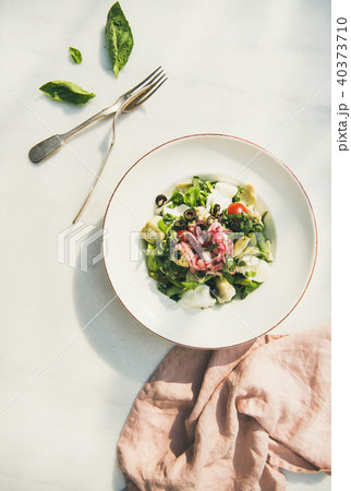 Fresh green summer salad with artichokes, top view 40373710