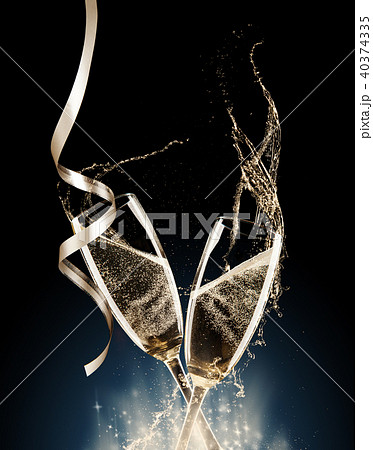 Champagne glasses on black background 40374335