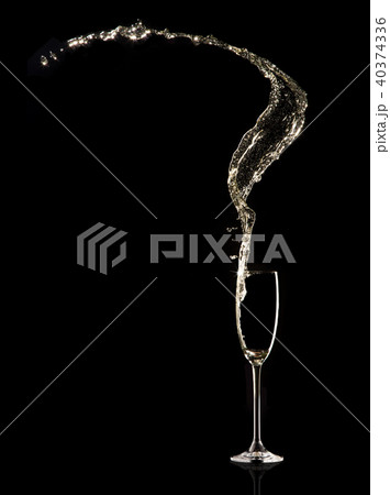 Glass of champagne on black background 40374336