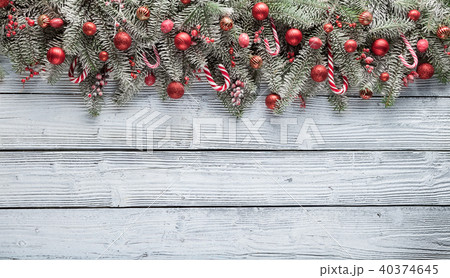 Christmas fir tree with decoration on a wooden board 40374645