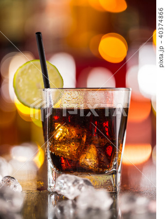 Glass of cola drink on bar counter 40374866