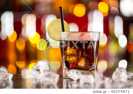 Glass of cola drink on bar counter 40374971