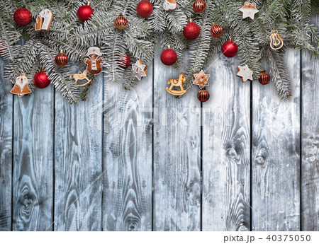 Christmas fir tree with decoration on planks background 40375050