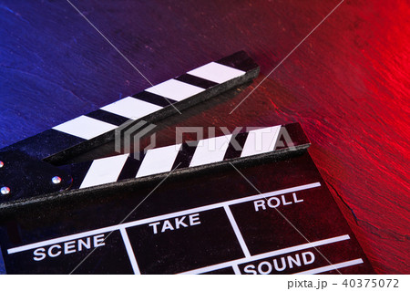 Cinema clapboard on black stone Cinema clapboard on black stone 40375072