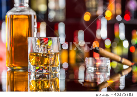 Whiskey drink on bar counter 40375383