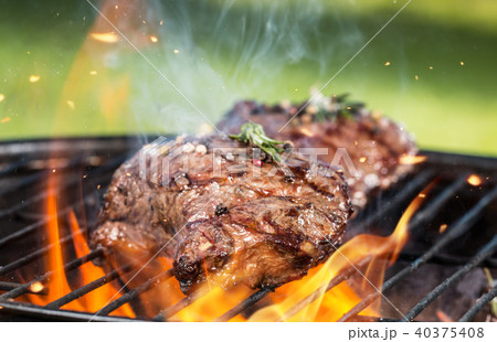 Beef steaks on grill Beef steaks on grill 40375408