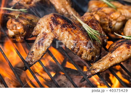 Grilled chicken wings on fire Grilled chicken wings on fire 40375429