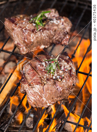 Beef steaks on grill Beef steaks on grill 40375436