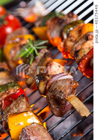 Vegetable and meat skewer on grill Vegetable and meat skewer on grill 40375449