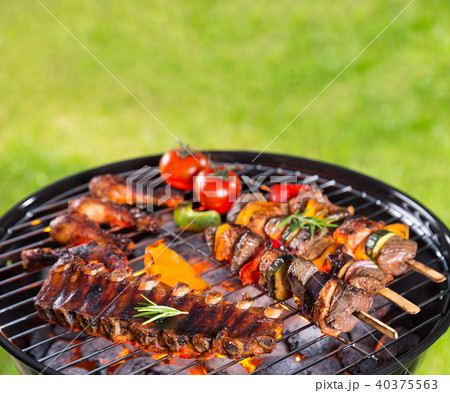 Barbecue grill with various kinds of meat 40375563