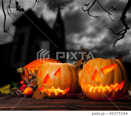Halloween pumpkins with church on background Halloween pumpkins with church on background 40375594