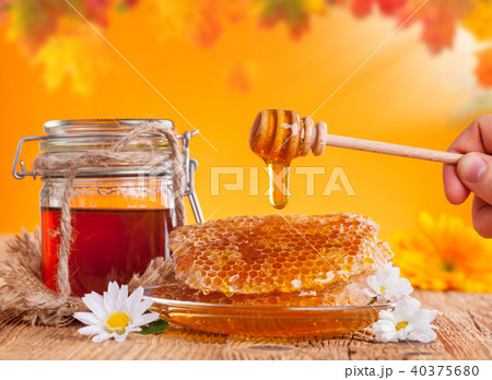 Fresh honey with dipper 40375680
