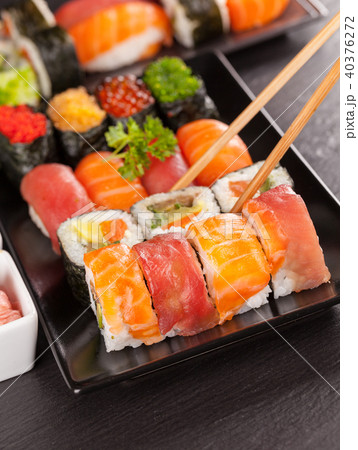 sushi pieces with chopsticks sushi pieces with chopsticks 40376272
