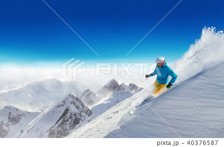 Man skier running downhill 40376587