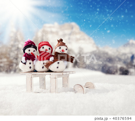 Winter snowy scenery with snow men 40376594
