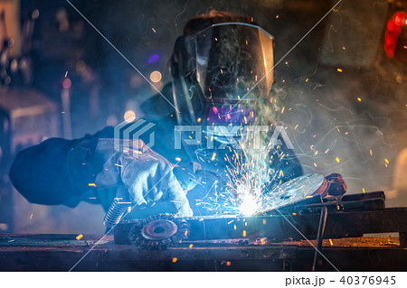 Welder in action. Low depth of focus 40376945