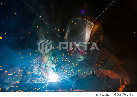 Welder in action. Low depth of focus 40376949
