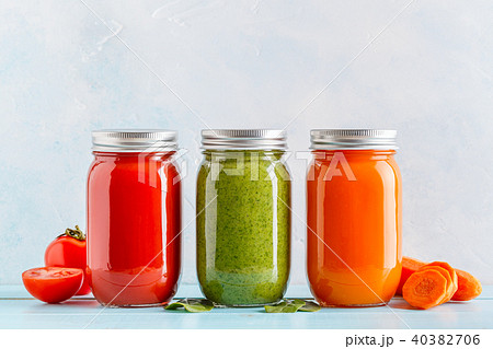 Orange/green/red colored smoothies / juice in jar Orange/green/red colored smoothies / juice in jar 40382706