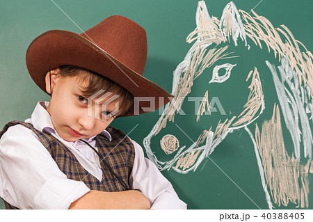 Boy artist cowboy with a horse drawn by him 40388405