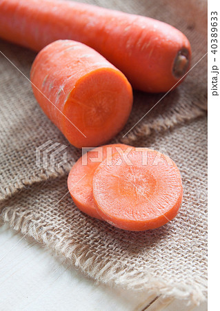 Fresh carrot and cut pieces on table, Healthy food 40389633