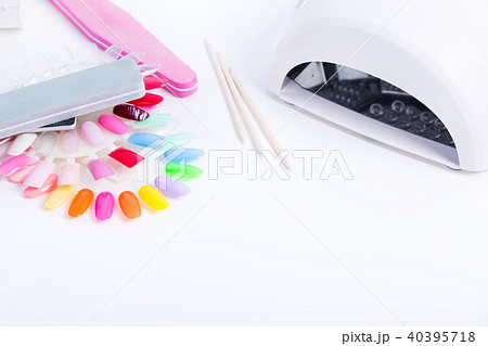 Nail LED lamp, colour gel polishes and pink file 40395718