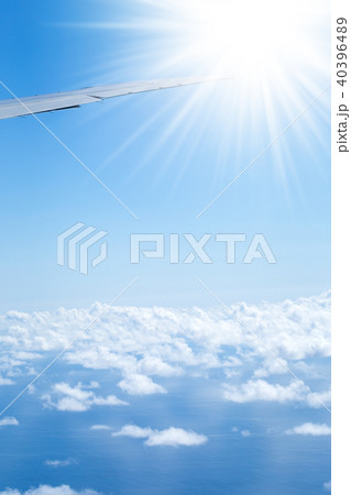 Aerial view from plane on wing and clouds 40396489