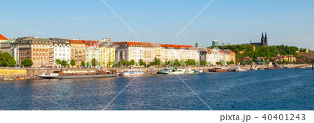 Rasin Embankment with boats on Vltava River on sunny summer day. Prague, Czech Republic 40401243