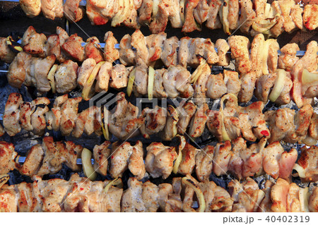 Cooked pork meat. Barbecue lunch. shashlik closeup Cooked pork meat. Barbecue lunch. shashlik closeup 40402319