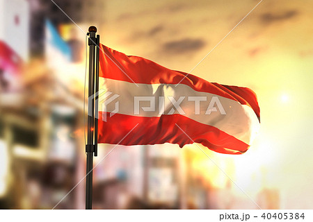 Austria Flag Against City Blurred Background 40405384