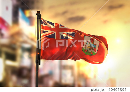 Bermuda Flag Against City Blurred Background Bermuda Flag Against City Blurred Background 40405395