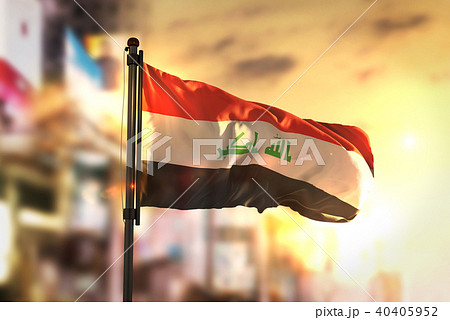 Iraq Flag Against City Blurred Background 40405952