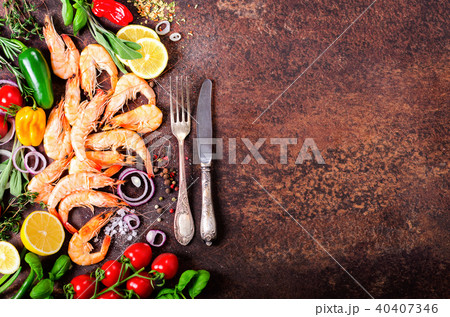 Fresh fish, shrimps with herbs, spices and Fresh fish, shrimps with herbs, spices and 40407346