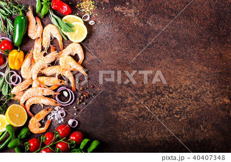 Fresh fish, shrimps with herbs, spices and Fresh fish, shrimps with herbs, spices and 40407348