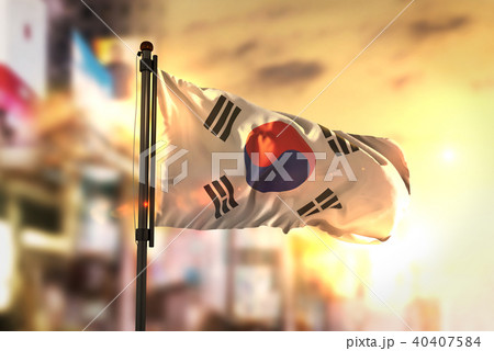 South Korea Flag Against City Blurred Background 40407584