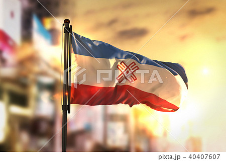 Mari El Flag Against City Blurred Background Mari El Flag Against City Blurred Background 40407607