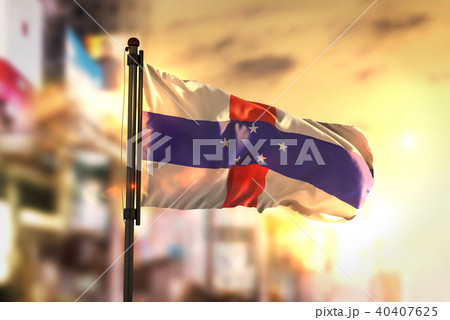 Netherlands Antilles Flag Against City Blurred 40407625
