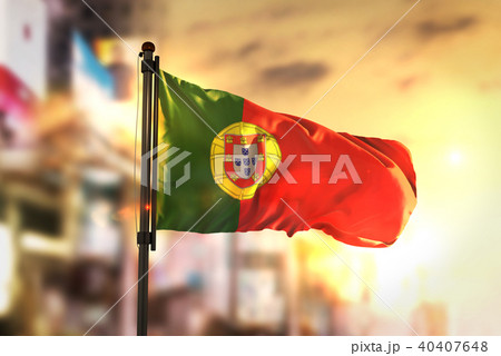 Portugal Flag Against City Blurred Background Portugal Flag Against City Blurred Background 40407648