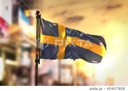 Sweden Flag Against City Blurred Background Sweden Flag Against City Blurred Background 40407808