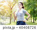 Young woman running at the park 40408726
