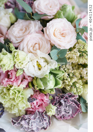 flower arrangement. multicolor bouquet of beautiful flowers on wooden table. Floristry concept flower arrangement. multicolor bouquet of beautiful flowers on wooden table. Floristry concept 40411432