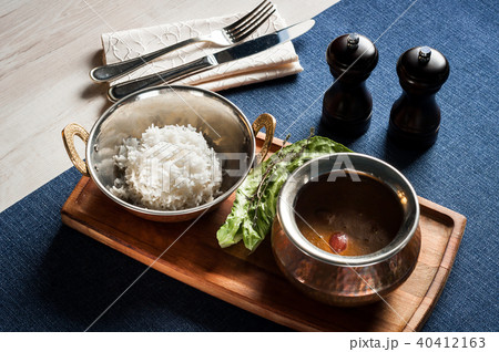 Oriental soup with rice and bread rolls with sesam Oriental soup with rice and bread rolls with sesam 40412163