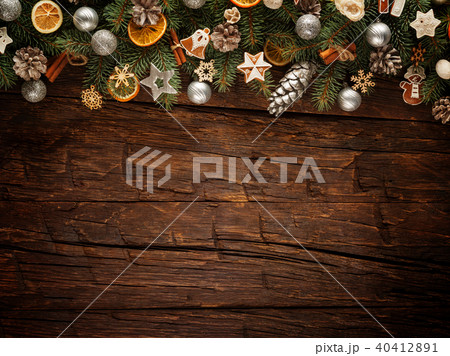 Christmas fir tree with decoration on a wooden board Christmas fir tree with decoration on a wooden board 40412891