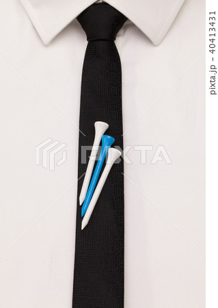 The detail of white shirt and black tie The detail of white shirt and black tie 40413431