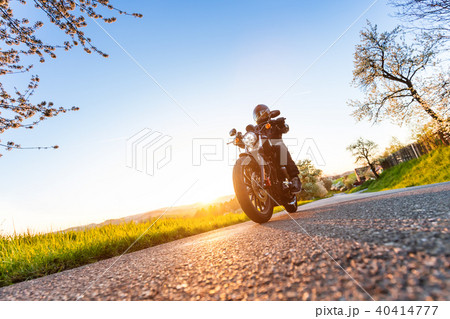 Young man driving chopper 40414777