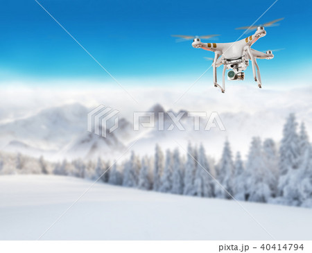 Flying drone in winter landscape 40414794