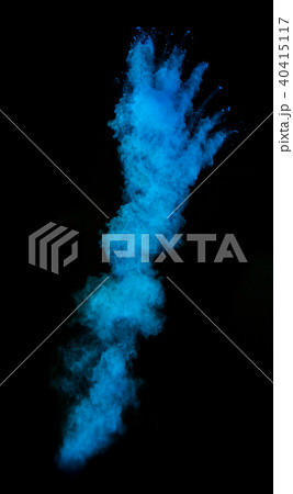Freeze motion of blue dust explosion on black background Freeze motion of blue dust explosion on black background 40415117