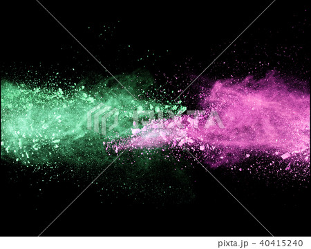 Explosion of colored powder on black background Explosion of colored powder on black background 40415240